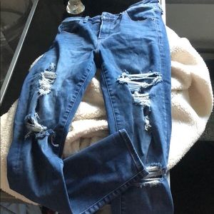 Dark blue, ripped jeans, very high waisted